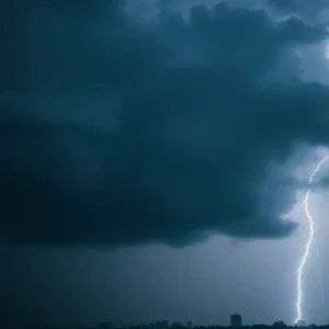 Dark storm clouds and heavy rain over Houston skyline